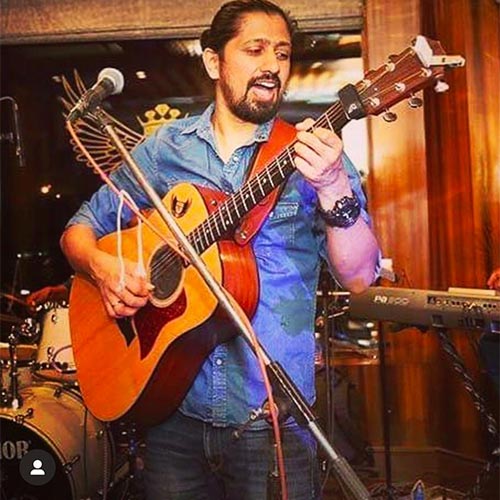 Vivek Sharma playing classical guitar